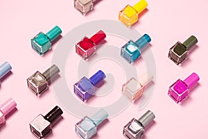 Nail polish bottles pattern background. Close up