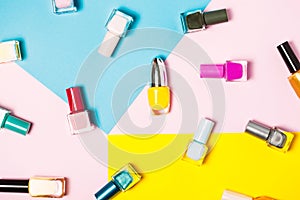 Nail polish bottles pattern background. Close up