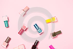 Nail polish bottles pattern background. Close up