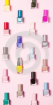 Nail polish bottles pattern background. Close up