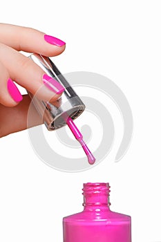 Nail polish. Close-up of female hand holding a nail polishing br