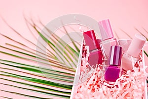 Nail polish isolated on pink background