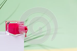 Nail polish isolated on pink background