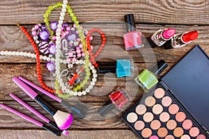 Nail polish, lipstick, beads, eye shadow, brushes