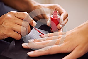 Nail polish, manicure and hands of woman with red color for salon treatment, cosmetics and pamper. Luxury spa