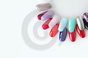 Nail polish samples in different bright colors.