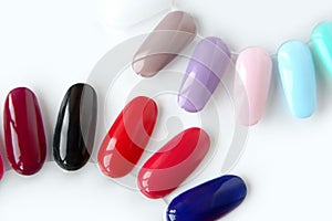 Nail polish samples in different bright colors.