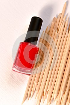 nail polish and wooden sticks for manicure and pedicure