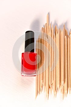 nail polish and wooden sticks for manicure and pedicure