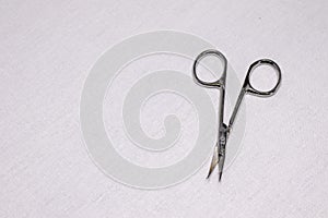 Nail scissors on a white background.