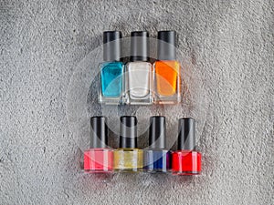 Nail varnish paint bottle displayed on textured background