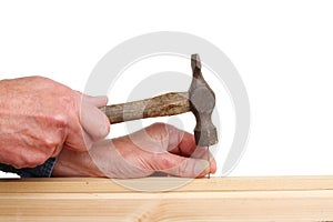 Nailing wood photo