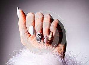 Nails Design. Hands With Bright Pink and White Manicure On Background. Close Up Of Female Hands. Art Nail. New Year manicure