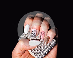 Nails Design. Hands With Pink and White Manicure On Background. Close Up Of Female Hands. Art Nail. New Year manicure