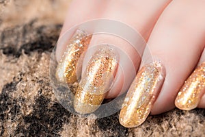 Nails in gold