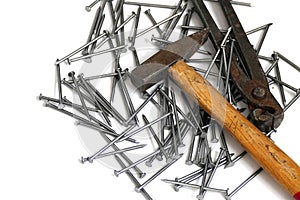 Nails, hammer and pincers on a white background