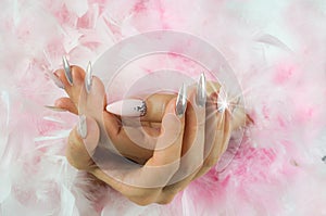 Nails pink and pearl with diamonds