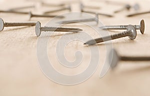 Nails on Wooden Board