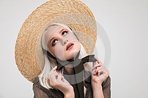 Naive Beautiful Blonde Woman in Straw Hat