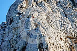 Mountain climbers climb the rocks of the National Parc des Calanques at Calanque Port Pin between Marseille and Cassis, Bouches-du