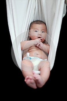 Baby in White Hammock Sling