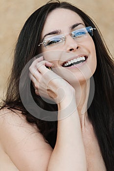 Naked brunette glasses phone