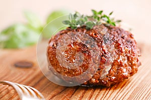 Naked burger on wooden plate