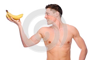 Naked man with fruit