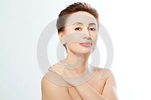 Naked woman isolated on white background. Anti aging concept. Mother day