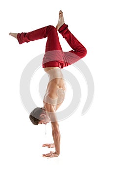 naked young dancer standing on hands