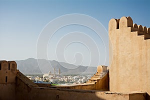 Nakhal Mosquea seen from the crenellated walls of the fort Oman photo