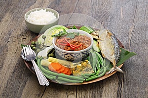 Nam phrik pla thu ; vegetables with short mackerel dipping paste , thai food