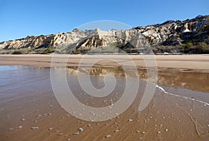Colourful Dunes of Playa de Rompeculos beach in Mazagon, Spain photo