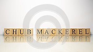 The name Chub mackerel was created from wooden letter cubes. Seafood and food.