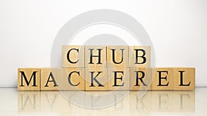 The name Chub mackerel was created from wooden letter cubes. Seafood and food.