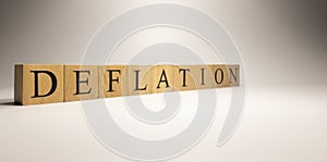 The name Deflation was created from wooden letter cubes. Economics and finance.