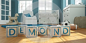 The name demond written with wooden toy cubes in children`s room