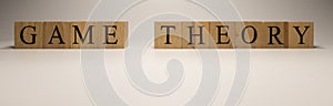 The name game theory was created from wooden letter cubes.