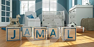 The name jamal written with wooden toy cubes in children`s room