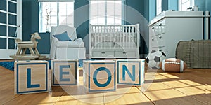 The name leon written with wooden toy cubes in children`s room