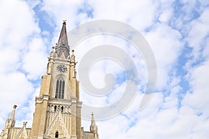 The Name of Mary Church, Novi Sad catholic cathedral during a spring partly cloudy day