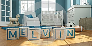 The name melvin written with wooden toy cubes in children`s room