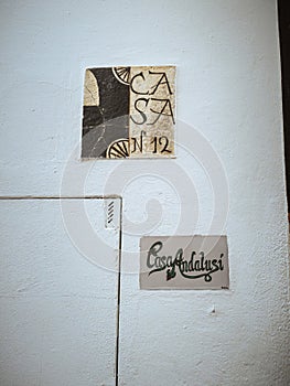 Name tablet tile of the Casa Andalusi (House of Andalusia), Cordoba, Andalusia, Spain photo