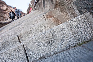 Name of Tai Shan carved into a stone step on the way to the mountain summit, China