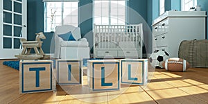 The name till written with wooden toy cubes in children`s room