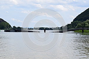 Namedy, Germany - 06 29 2021: crahsed, broken, sunk bridge in the Rhine near Andernach