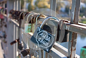 Names on the padlocks as a proof of love