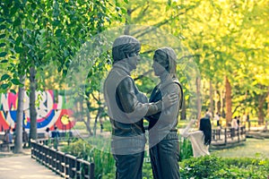 NAMI ISLAND, KOREA: The statue Bae Yong-Joon and Choi Ji-woo Tourists taking photos of the beautiful scenery Nami Island on