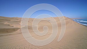 The Namib desert meeting the Atlantic ocean in the Skeleton Coast in Namibia.