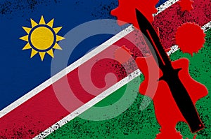 Namibia flag and black tactical knife in red blood. Concept for terror attack or military operations with lethal outcome